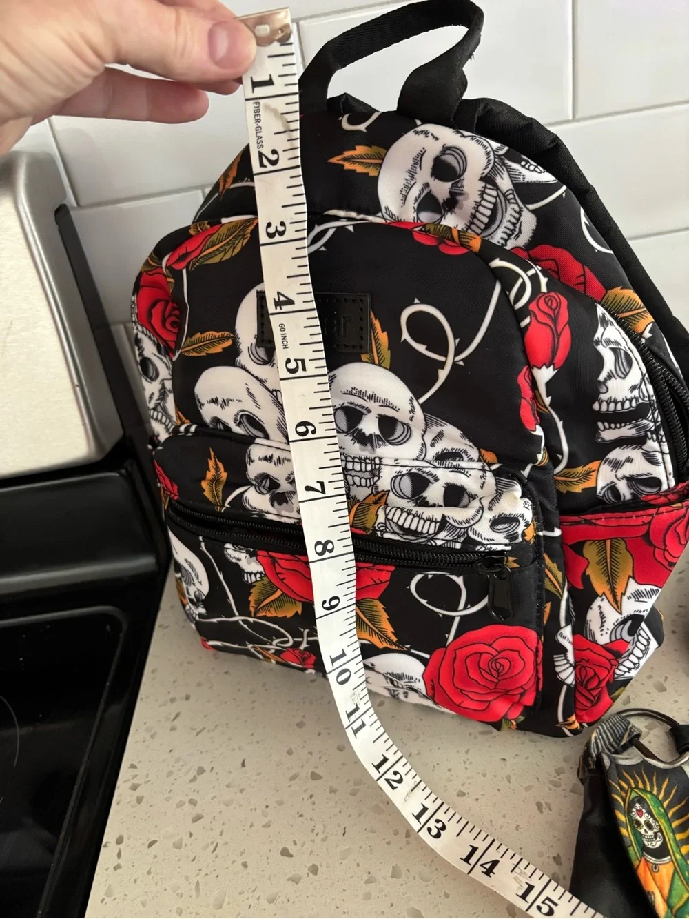 Skull & Red Rose Mini Backpack by Fyldan and small crossbody bag by Canary